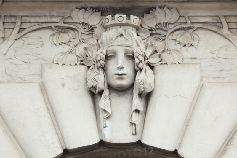 Allegorical mascaron dedicated to European Railways on the Art Nouveau building of the Main Railway Station in Prague, Czech Rep