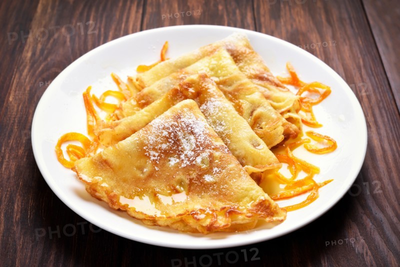 Crepes pancakes with orange sauce