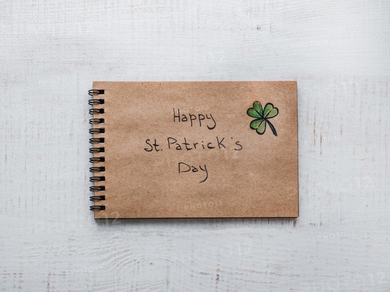 St.Patrick 's Day. Beautiful card. Sketchbook with congratulatory inscription