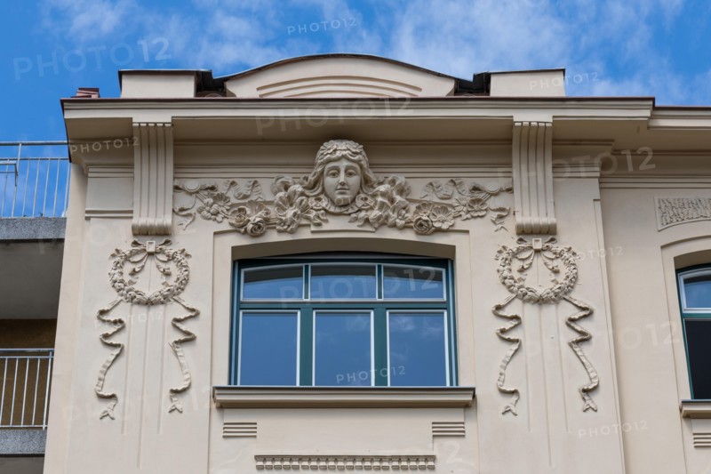 Architectural details on the facade of a building in Ljubljana, Slovenia
