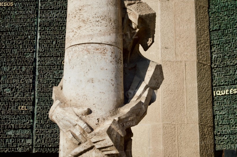 A sculpture of Jesus on the passion facade of La Sagrada Familia in Barcelona, Spain