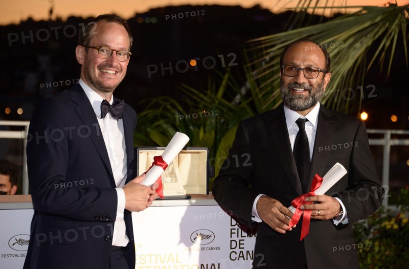July 17, 2021, CANNES, France: Juho Kuosmanen and Asghar Farhadi pose with the 'Grand Prix' Ex-Aequo for 'Hytti nro 6' and for 'A Hero' during the 74th annual Cannes Film Festival on July 17, 2021 in Cannes, France. (Credit Image: © Frederick InjimbertZUMA Press Wire)