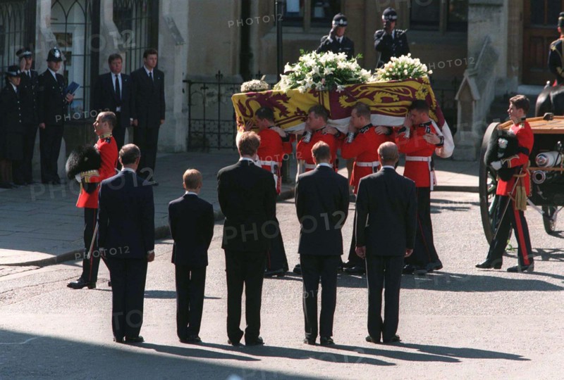 Prince Philip, Duke of Edinburgh, Prince William, Earl Spencer, Prince Harry and Prince Charles, Prince of Wales follow the coffin of Diana, Princess of Wales at her funeral on September 6, 1997 in London.