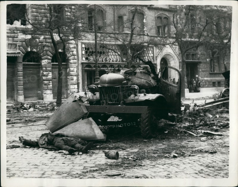 Oct. 10, 1956 - Battle scene in the streets of Budapest a Russian lies dead: Photo shows The devastating scene in Baross street