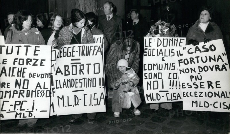 Feb. 26, 2012 - Abortion Rally - Many demonstrators took part in a rally organized by the Feminine Movement in front of the Parliament asking a law to introduce the free abortion in Italy. OPS:- Women seen with their various posters during the rally.