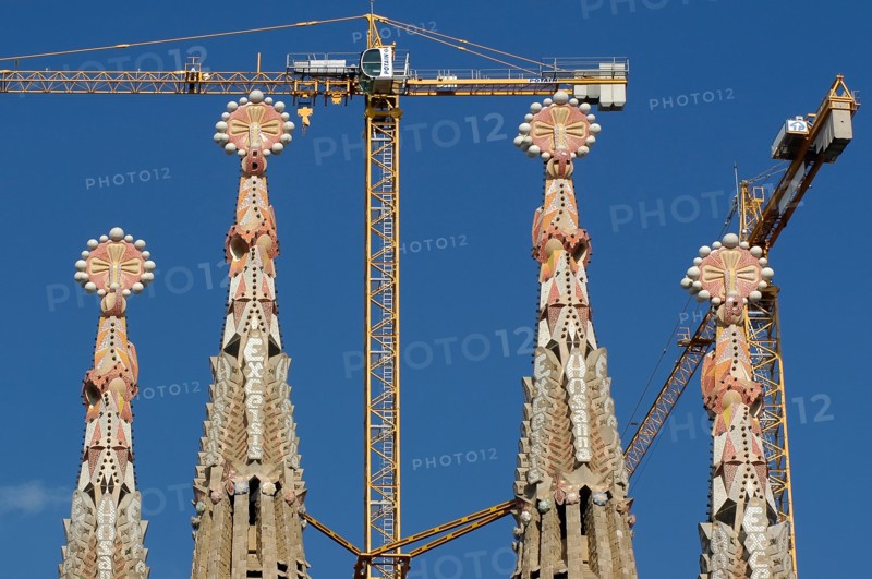 Artistic Tower of Sagrada Familia with crane