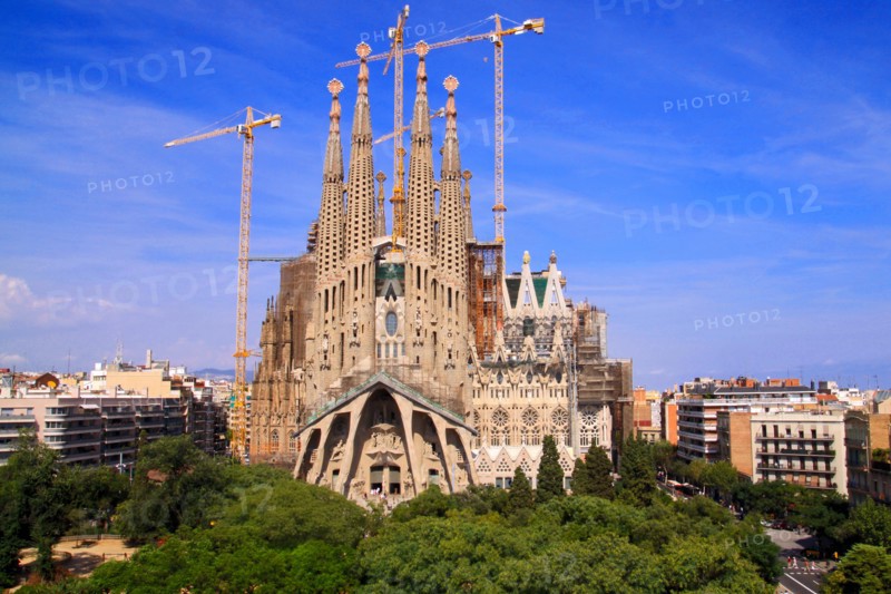 Sagrada Familia while renovations, taken from altitude just in front of the square across the street.
