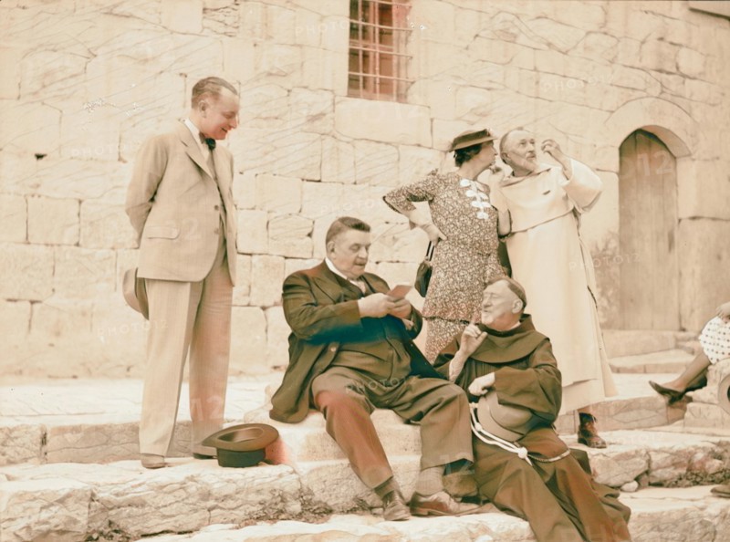 Monsieur & Madame Edouard Herriot visit to Jerusalem, May 11, 1938. Mr. Herriot & party in front of Church of Holy reimagined