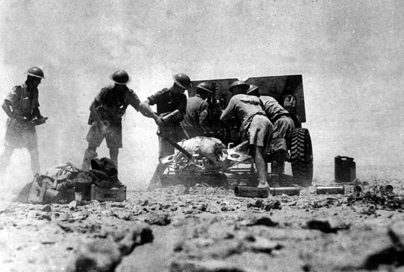 A 25 Pounder of the Royal Artillery seen here in an artillery duel with the Afrika Korps during the Battle for El Alamein in Egypt ;July 1942