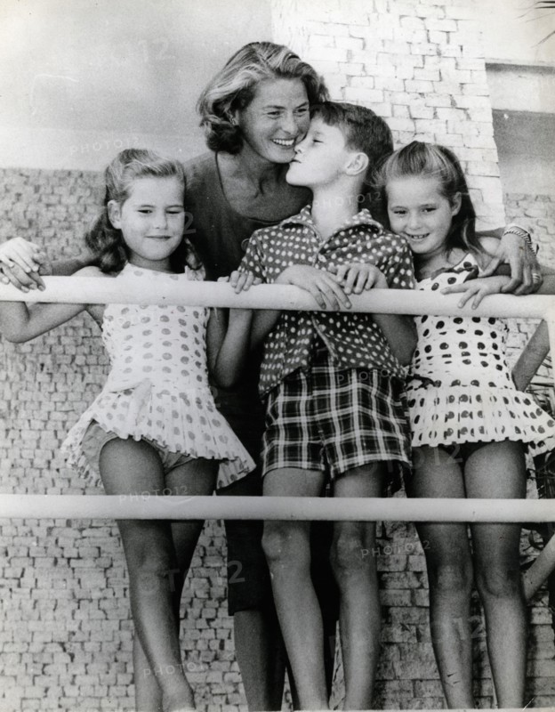 Actress Ingrid Bergman with her three children on a balcony
