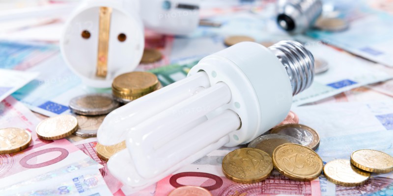 Light Bulbs on european banknotes (close-up shot)