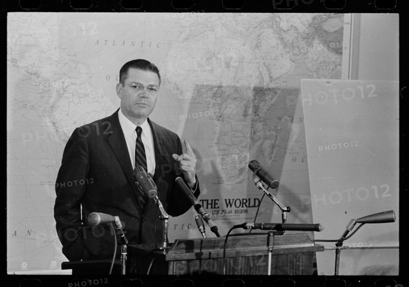 Secretary of Defense Robert McNamara answers questions on the Cuban situation at a press conference, Washington, DC, 10/23/1962. Photo by Marion S. Trikosko.