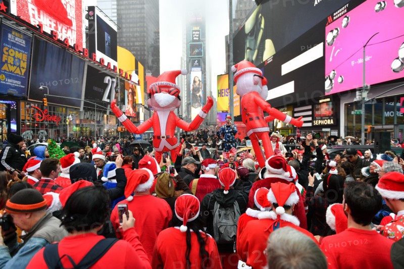 Hundreds of people participate in SantaCon NY, an annual pub crawl in which people dressed in Santa Claus costumes or as other Christmas characters pa