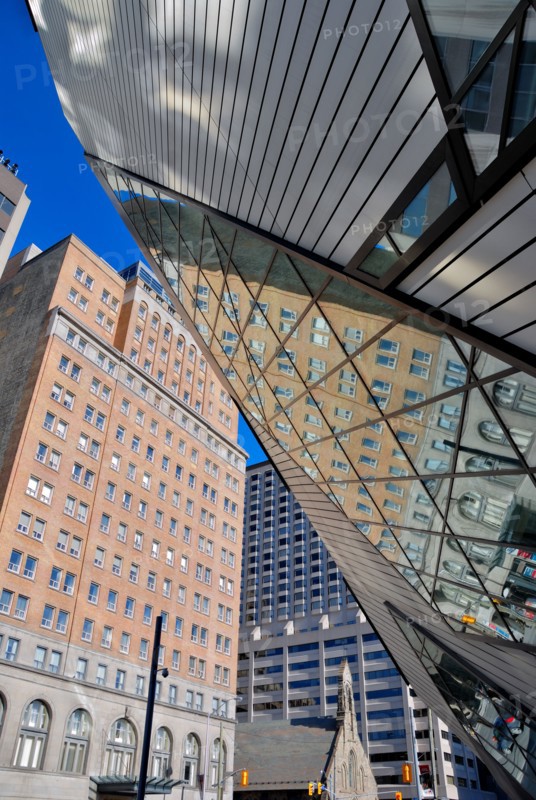 Buildings reflected in the bizarre and often criticized facade of Toronto's Royal Ontario Museum designed by Daniel Libeskind