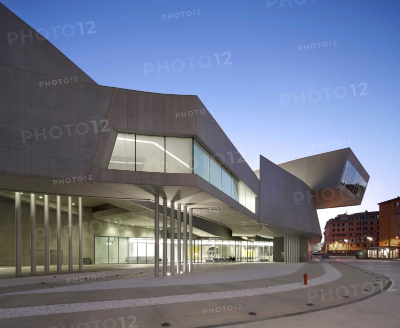 MAXXI – National Museum of the 21st Century Arts, Rome, Italy. Architect: Zaha Hadid Architects, 2009. Dusk exterior.