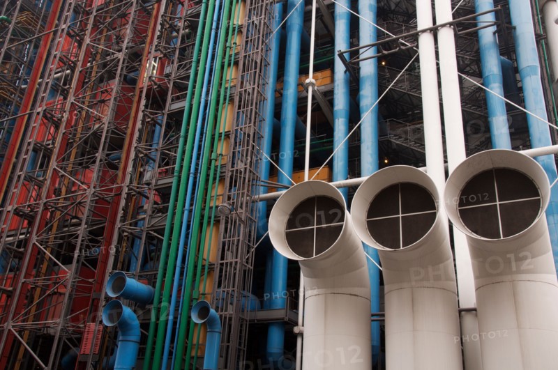 Modern architecture. The Pompidou Centre, seen from the Rue Beaubourg. The famous coloured pipes and ducts conspicuously on the outside. Paris, France.