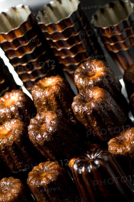 Cake canneles, french dessert in a bakery