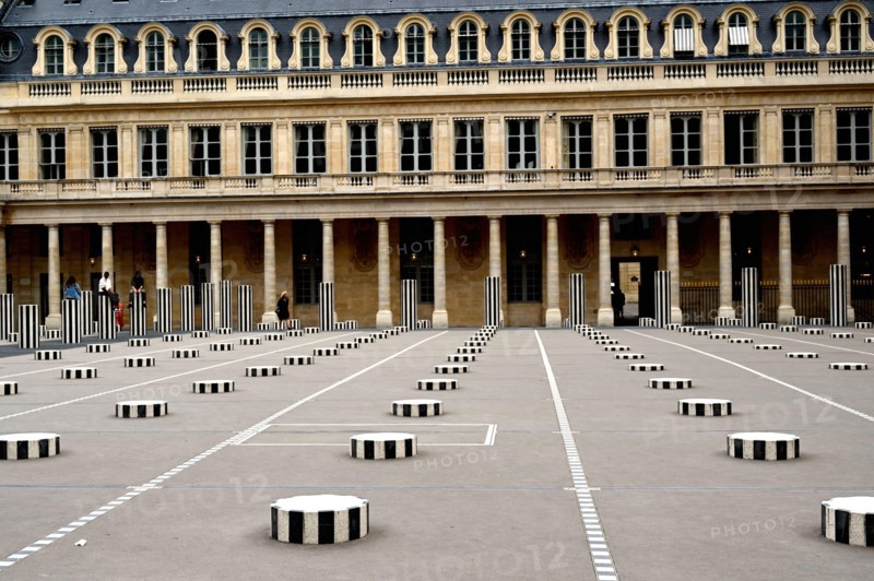 Paris, France - June 19, 2020: Cour d'Honneur in Palais Royal  in Paris, France : Famous Black and white Buren Columns