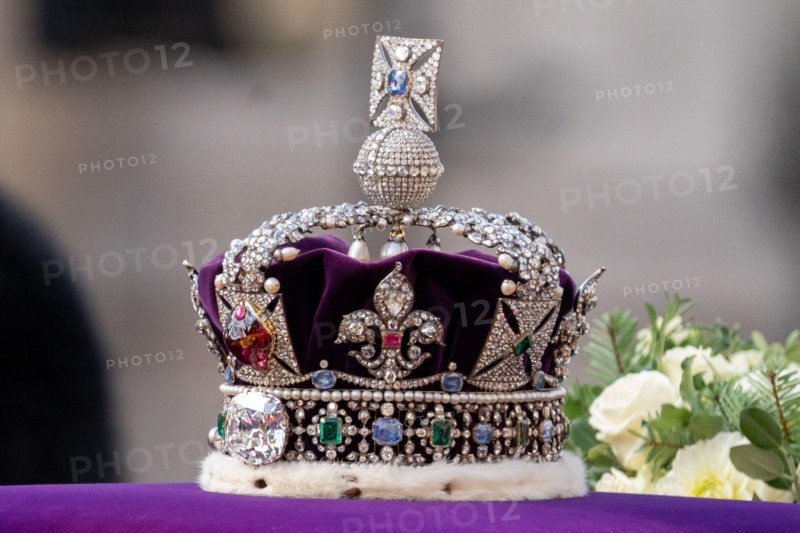 Queen Elizabeth II's coffin is taken in procession on a Gun Carriage of The King's Troop Royal Horse Artillery. The Coffin is draped with the Royal Standard with the Imperial State Crown on top followed by King Charles III and immediate Royal family at Whitehall, London, United Kingdom, 14th September 2022(Photo by Richard Washbrooke/News Images)