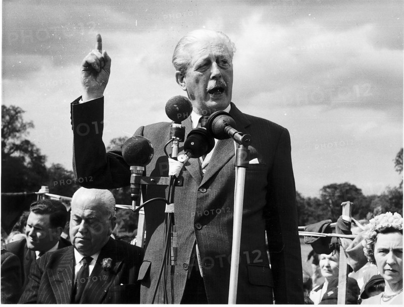 Prime Minister Harold MacMillan speaking at a 1963 Conservative Fete in Bromley Kent Having come to power in 1959 with the slogan You ve never had it so good Supermac was having it badly by the summer of 1963 By July the Profumo Scandal had culminated in the suicide of Stephen Ward the September Denning Report blamed Macmillan for his failure to handle the affair in October Macmillan was hospitalised and resigned power to the Earl of Home who resigned his peerage to serve but lost the following year s election to Labour s Harold Wilson