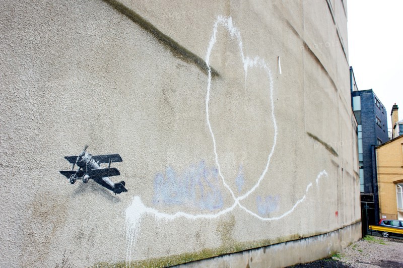 Banksy graffiti artwork on display in Liverpool, UK.