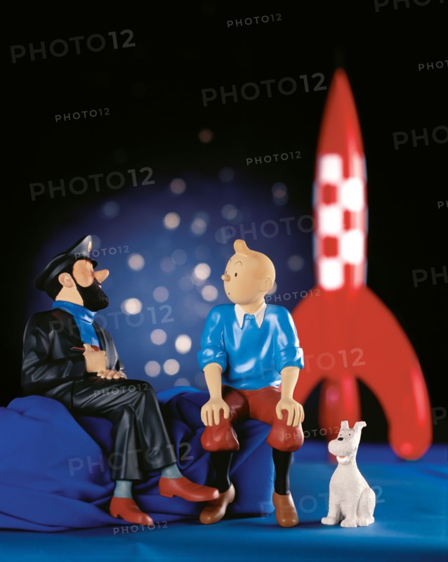 figurines shows the cartoon character, Captain Haddock ,Tintin and his dog Snowy,
