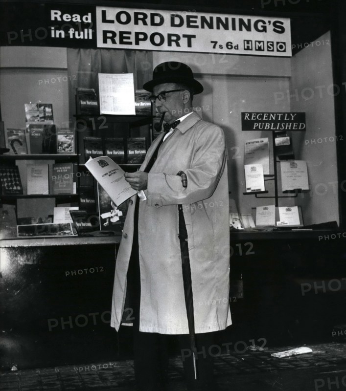 Sep. 09, 1963 - Lord Denning's report published. businessmen read it Lord Denning's report on the security aspects of the profumo affair published by the stationery office at 12.30 am today. photo shows Mr. Ernest Handley from Leeds, a business manager reads the Denning report this morning.