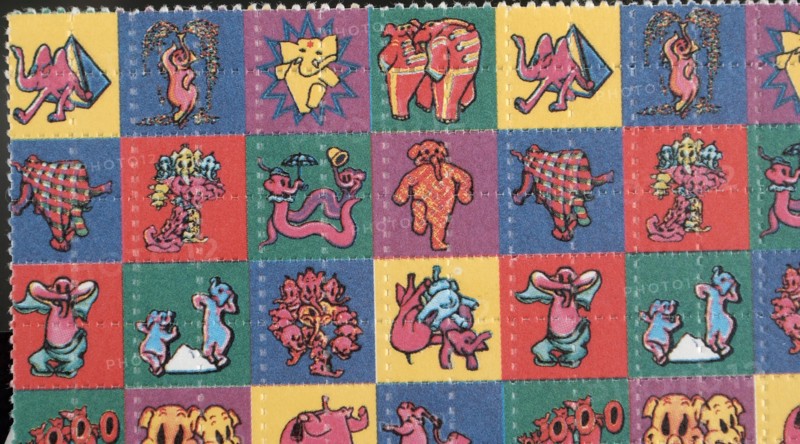 lsd in a colourful blotter. Lysergic acid diethylamide or acid, a psychedelic drug of the ergoline family, well known for its psychological effect