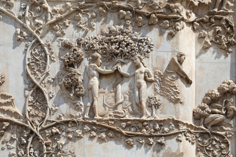 Adam & Eve in the garden of Eden, external bas-relief of Orvieto cathedral, Italy