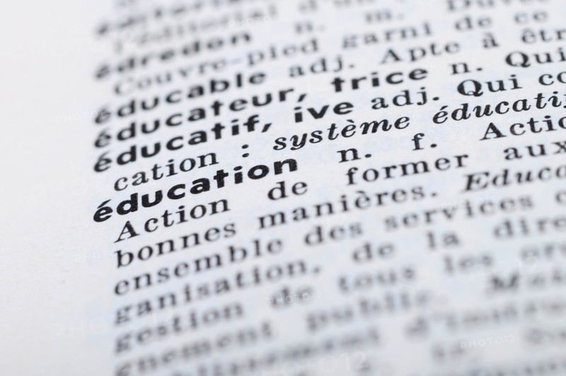 Close up of french dictionary at the word Education