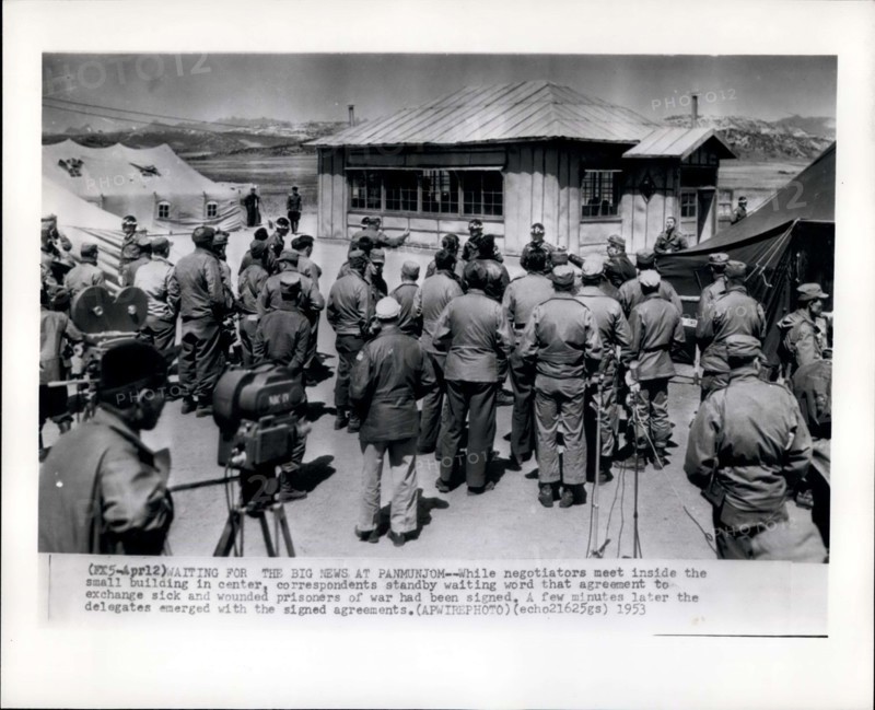 Apr. 12, 1953 - Waiting For The Big News At Panmunjom: While negotiators meet inside the small building in center, corresponded