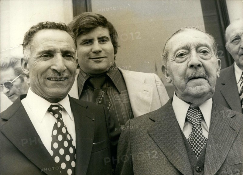 Jul. 16, 1976 - Alain Mimoun won the gold medal for the marathon at the Melbourne Olympics. Gaston Ragueneau won the silver medal for the 5000m at the 1900 Olympic Games in Paris. Standing in the back, Gonzales won the 1964 silver medal for boxing at the Tokyo games.