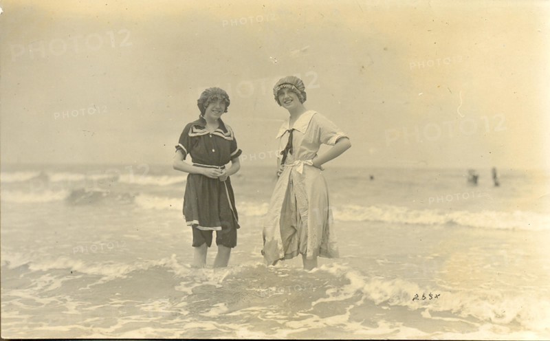 Photograph postcard of two girls in bathing costumes circa 1910