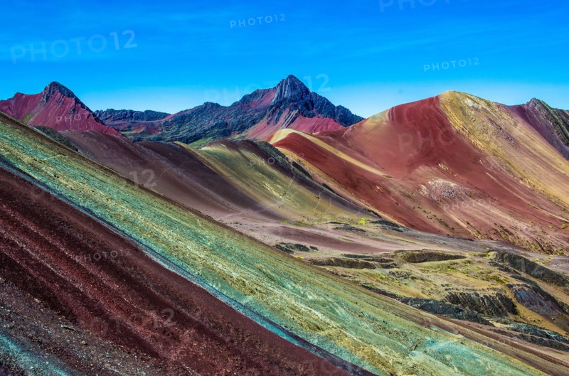 Vinicunca, Peru - Rainbow Mountain (5200 m) in Andes, Cordillera de los Andes, Cusco region in South America. Mountains Peru landscape