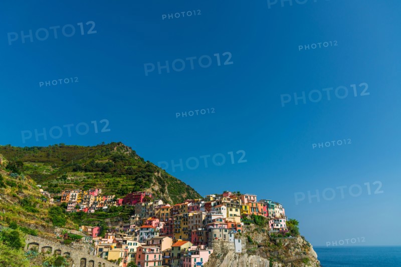 Manarola village in Cinque Terre, Italy, with its colorful houses.