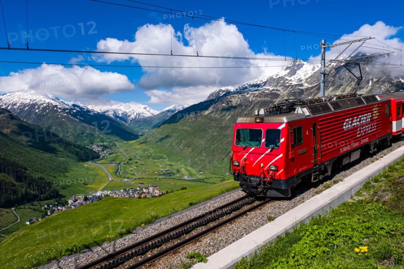 The train Glacier Express, connecting the two major mountain resorts of Zermatt and St. Moritz via Andermatt in the central Swiss Alps.