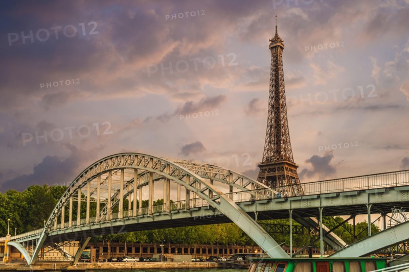 Debilly Footbridge and Eiffel Tower at riverbank of Seine in Paris, France