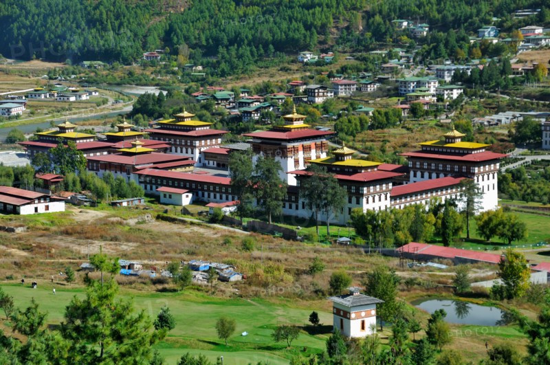 View of Thimphu Dzong over golf course, Bhutan