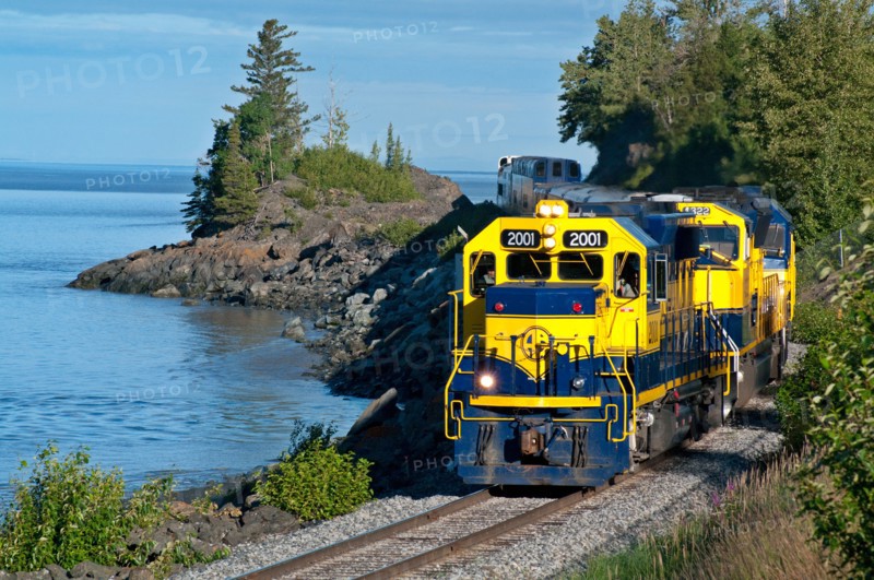 Alaska Railroad train riding along Turnagain Arm in Alaska