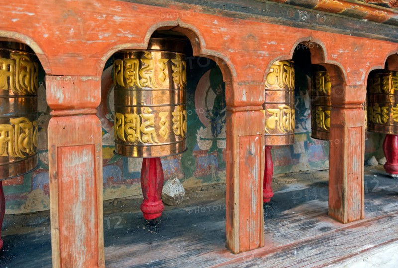 BU00367-00...BHUTAN - Prayer wheels at Kyichu Lhakhang near Paro, one of the oldest Temples in Bhutan.