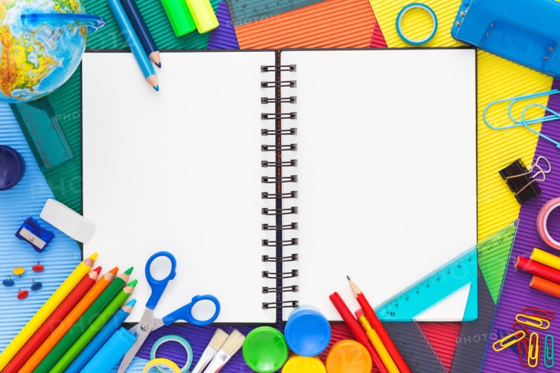 Back to school. Colorful composition of school supplies and blank notebook. Flat lay.