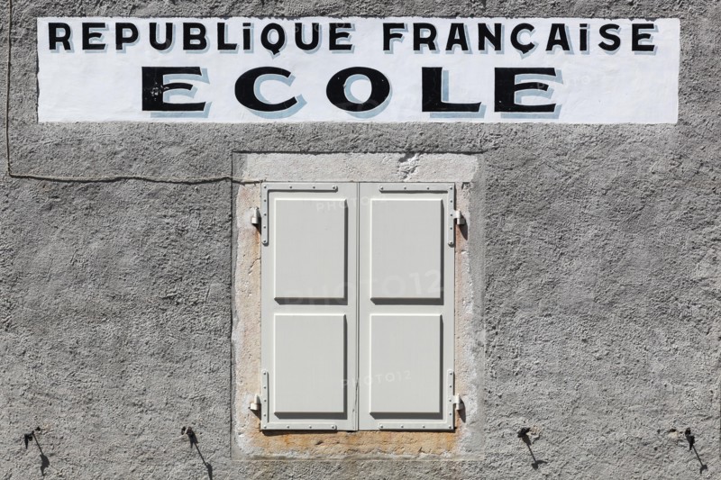 Vintage facade of a school from the French republic
