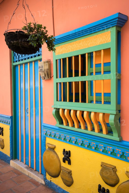 colourful colonial style building facade details in Guatape Colombia