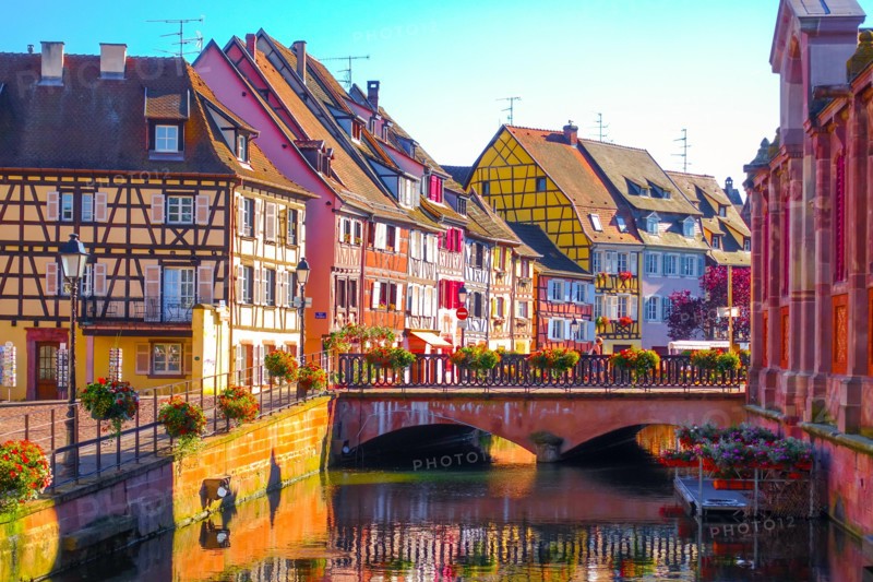 Beautiful late summer afternoon view of traditional colorful half-timbered buildings in the historical old town of Colmar, Alsace wine region in Franc