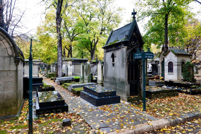 All Saints Day, in Montmartre Cemetery with autumnal, fallen leaves, Paris, France.