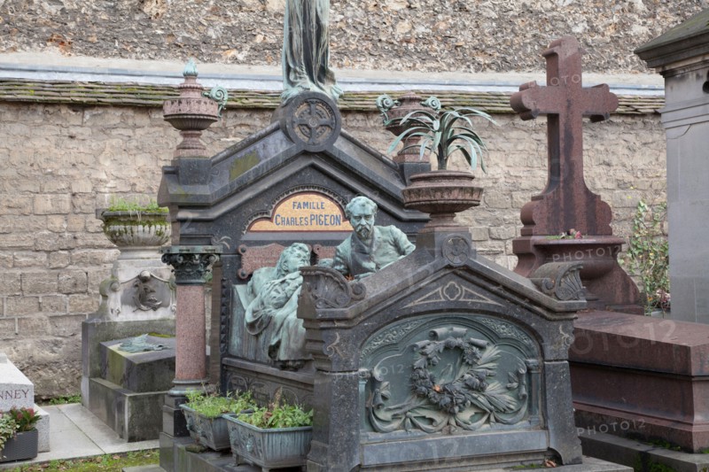 The family tomb of Charles Pigeon in Montparnasse Cemetery in Paris features a life sized bronze of Pigeon and his wife
