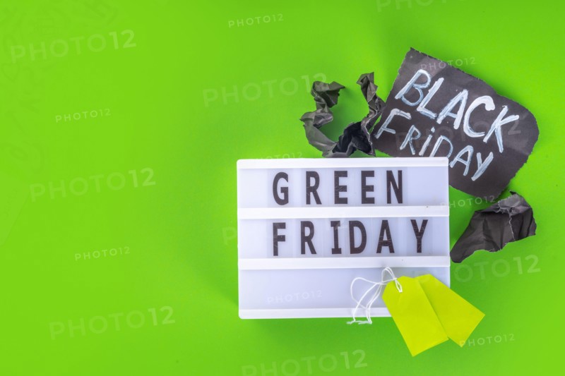 Green Friday concept with green sale and discounts tag, conscious and environmentally friendly shopping idea, useful things on sale instead of the usu