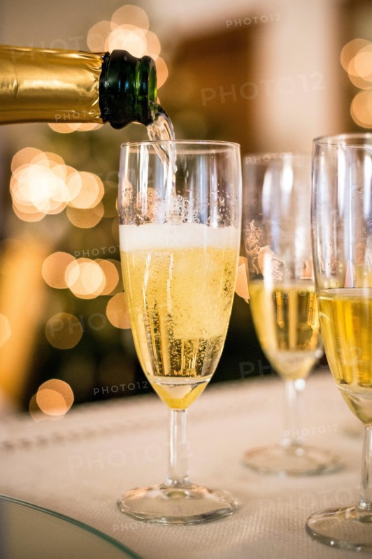 pouring out champagne