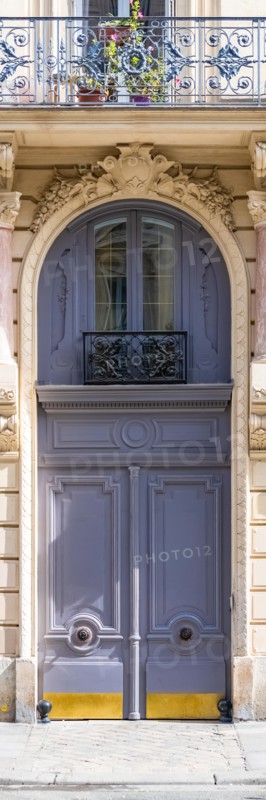 Paris, beautiful wooden door, typical window in the Marais