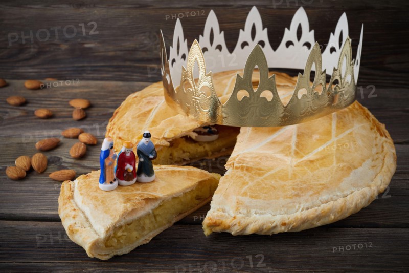 Epiphany cake, French Galette de rois with figure of three kings.